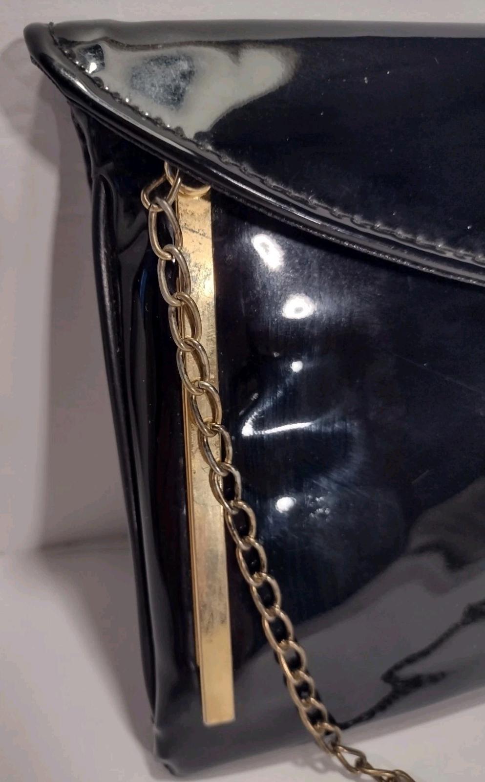 Vintage 1970s Black Patent Clutch Purse Gold Bar Accent Tuck‑In Chain Bag